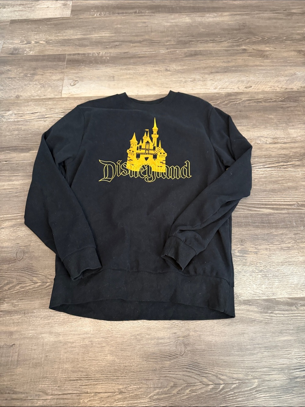Disneyland Black Sweatshirt with Gold Castle Graphic